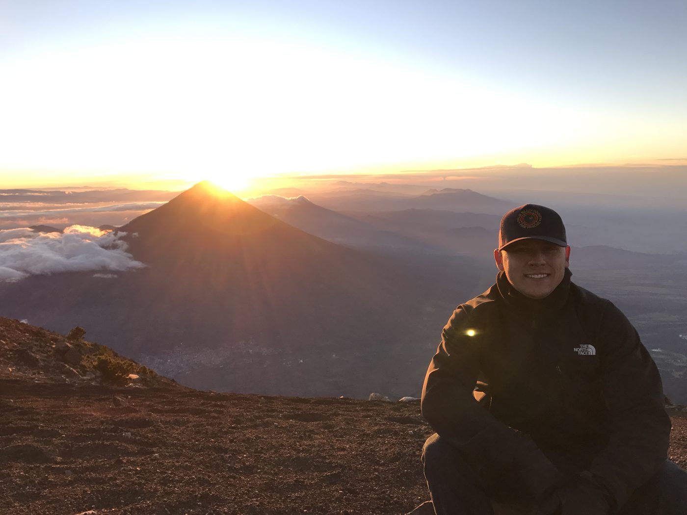 Bidwell Cranage at sunrise above the clouds on Acatenango in Guatemala